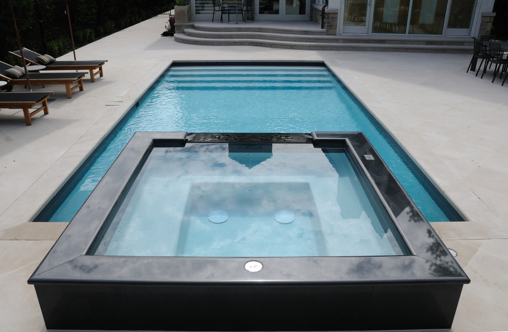 Design ideas for a medium sized contemporary back rectangular hot tub in Toronto.
