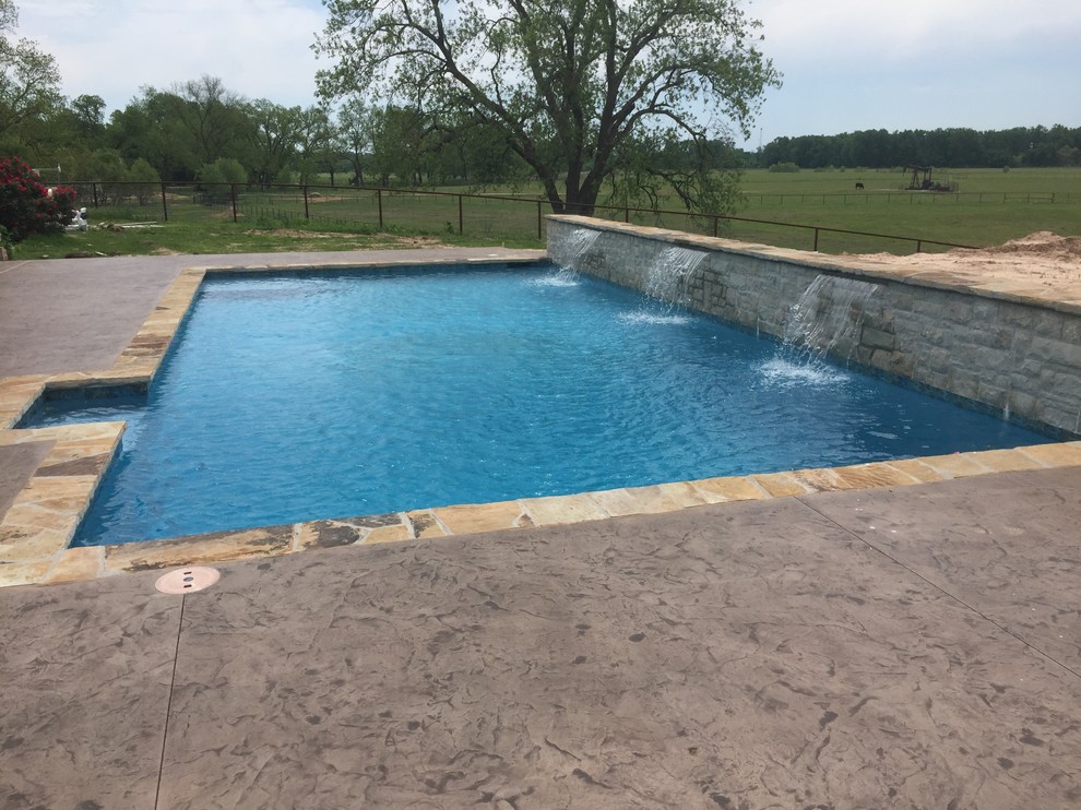 Design ideas for a medium sized rustic back swimming pool in Oklahoma City.