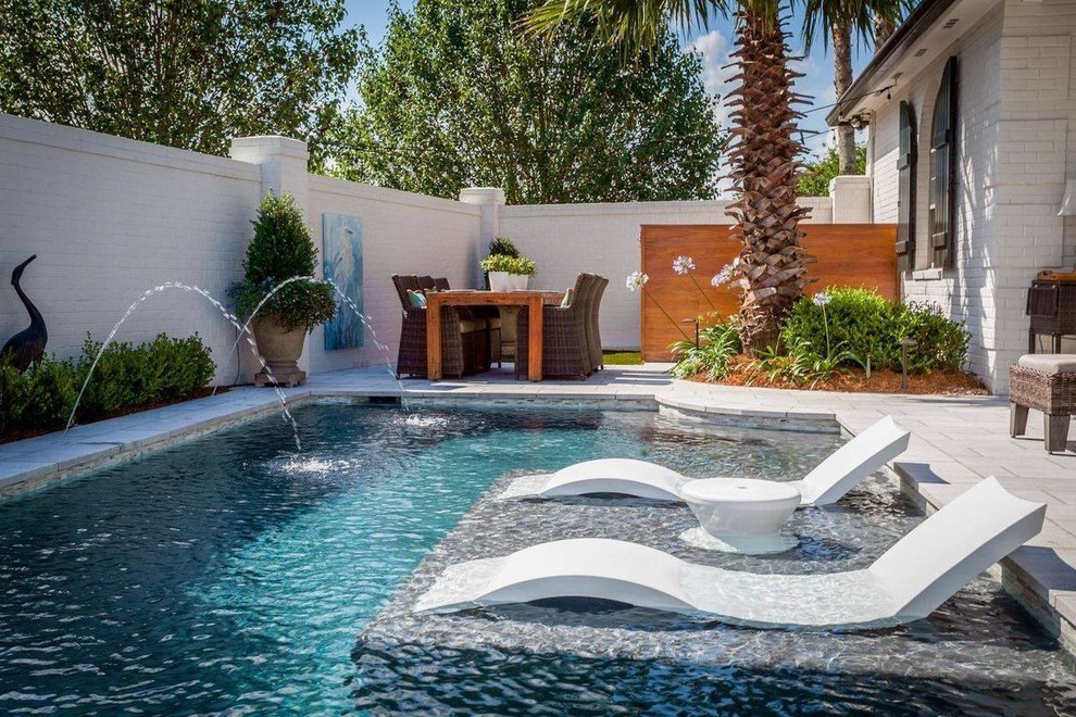 Pool - large contemporary backyard rectangular and concrete paver pool idea