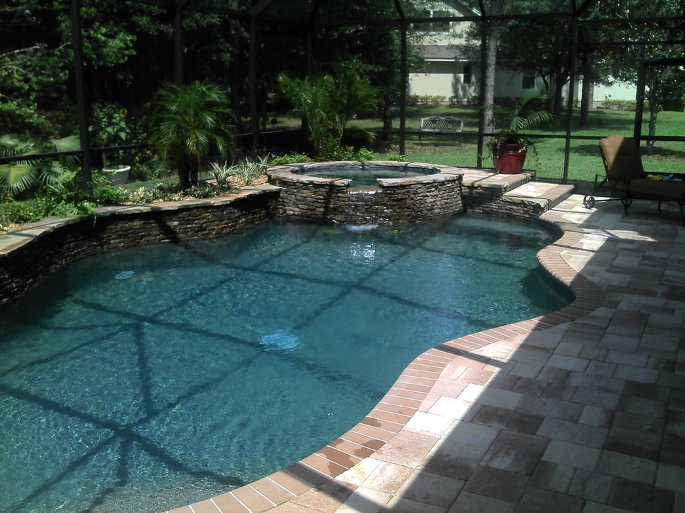 Small trendy backyard custom-shaped pool photo in Jacksonville