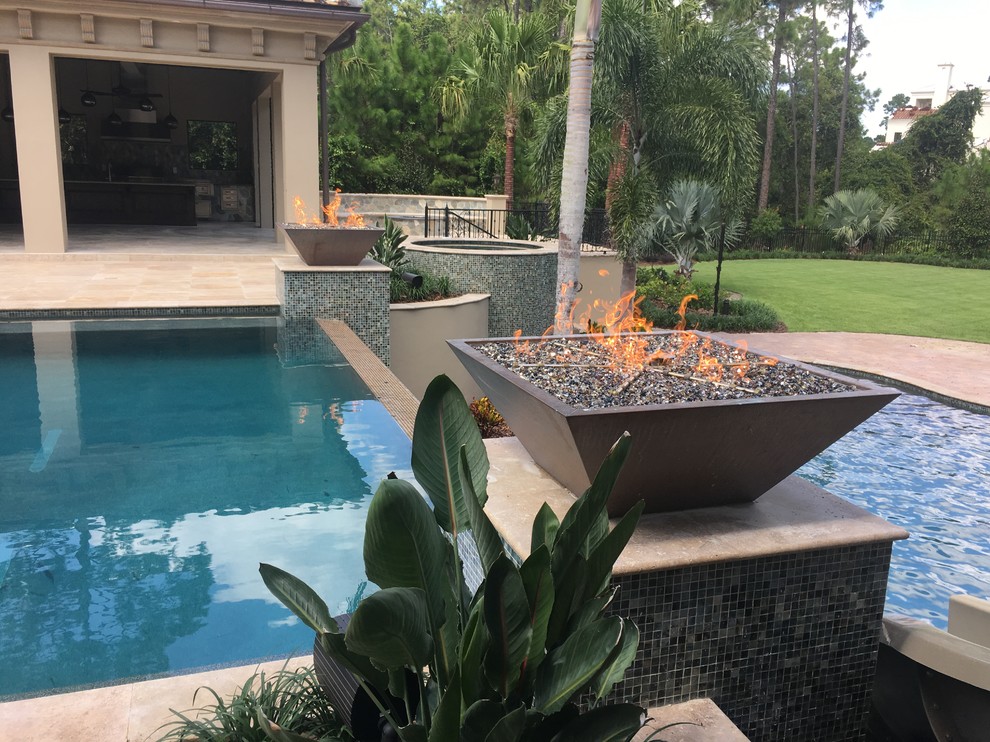 Inspiration for a huge mediterranean infinity pool remodel in Orlando