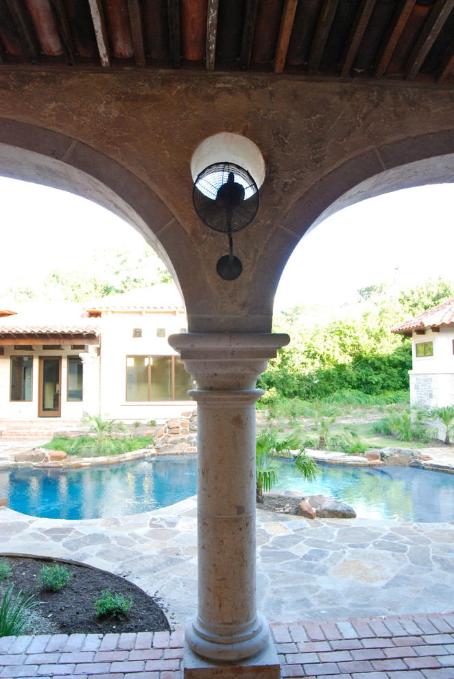 Inspiration for a mediterranean swimming pool in Austin.
