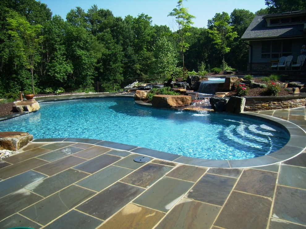 Delaware Township custom pool and raised spa with negative edge & water