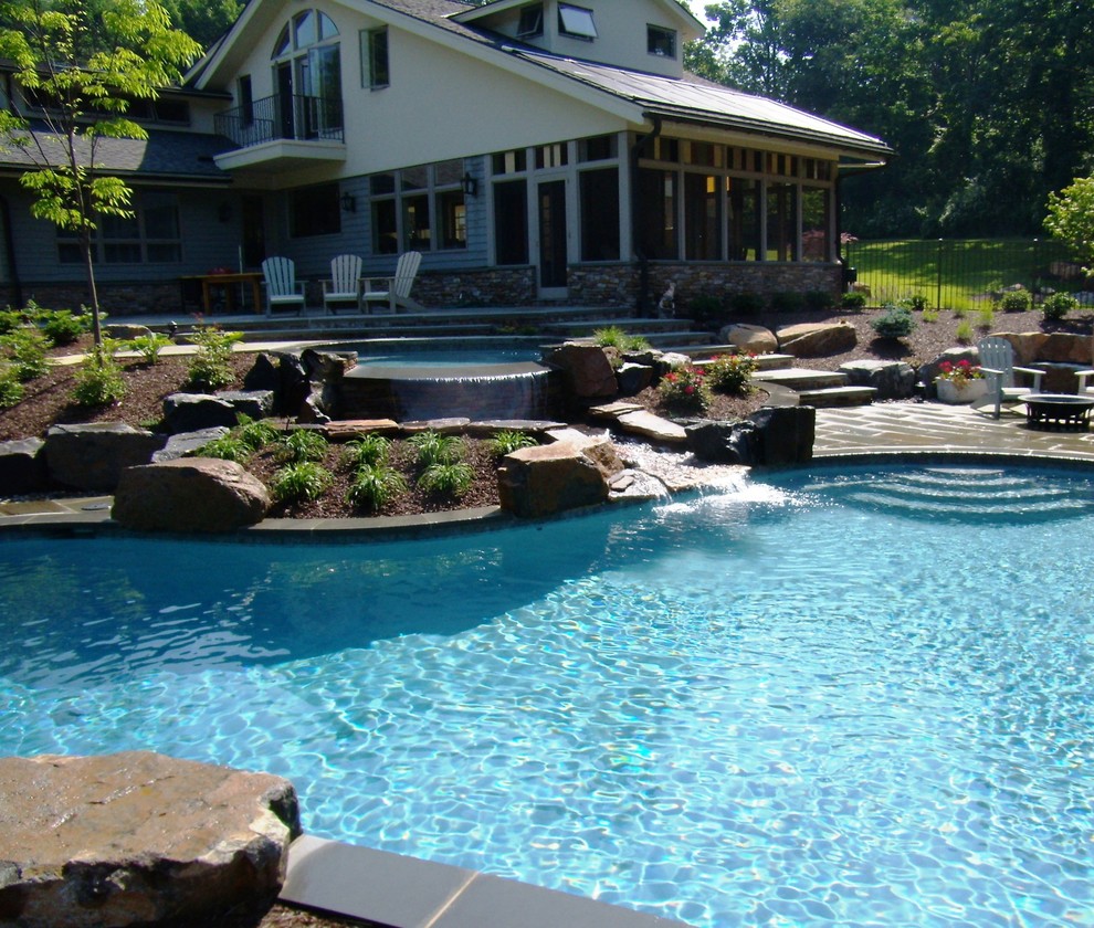 Delaware Township custom pool and raised spa with negative edge & water