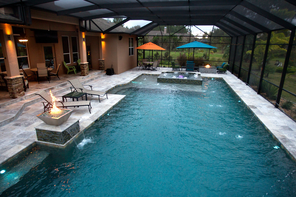 Design ideas for a traditional swimming pool in Orange County.