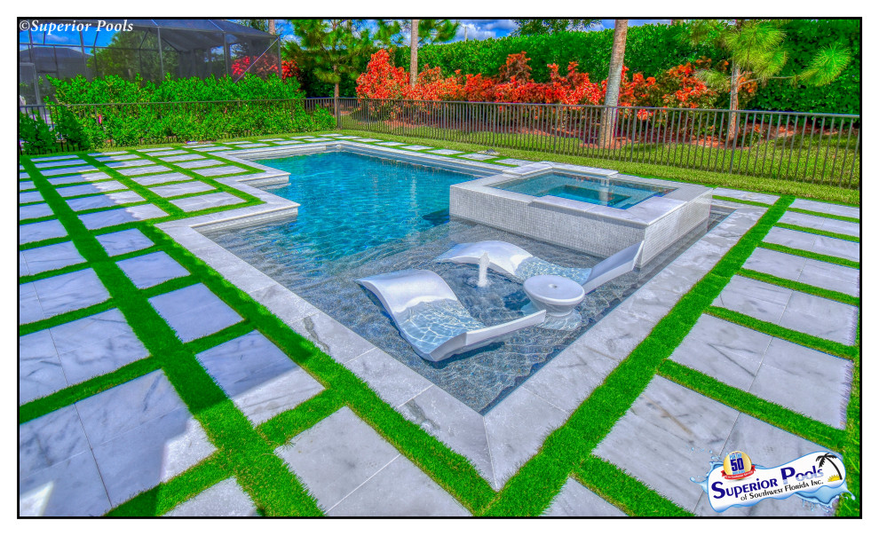 Design ideas for a medium sized modern courtyard custom shaped natural swimming pool in Tampa with a pool house and decking.