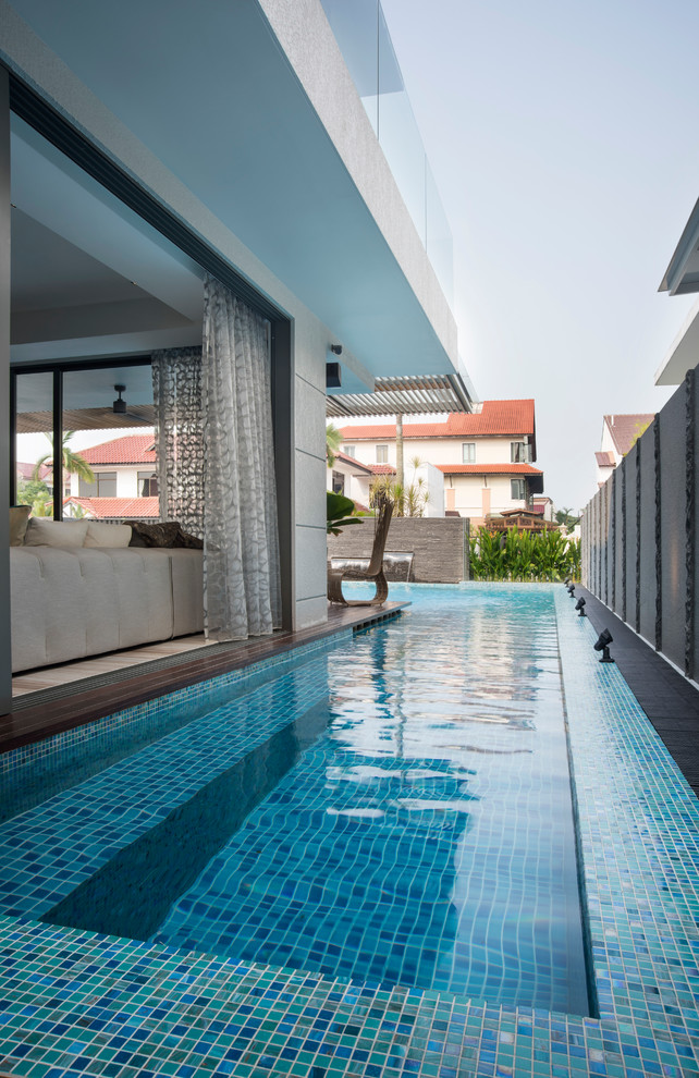 Inspiration for a contemporary swimming pool in Singapore.