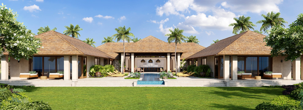 Inspiration for a huge backyard rectangular infinity hot tub remodel in Hawaii