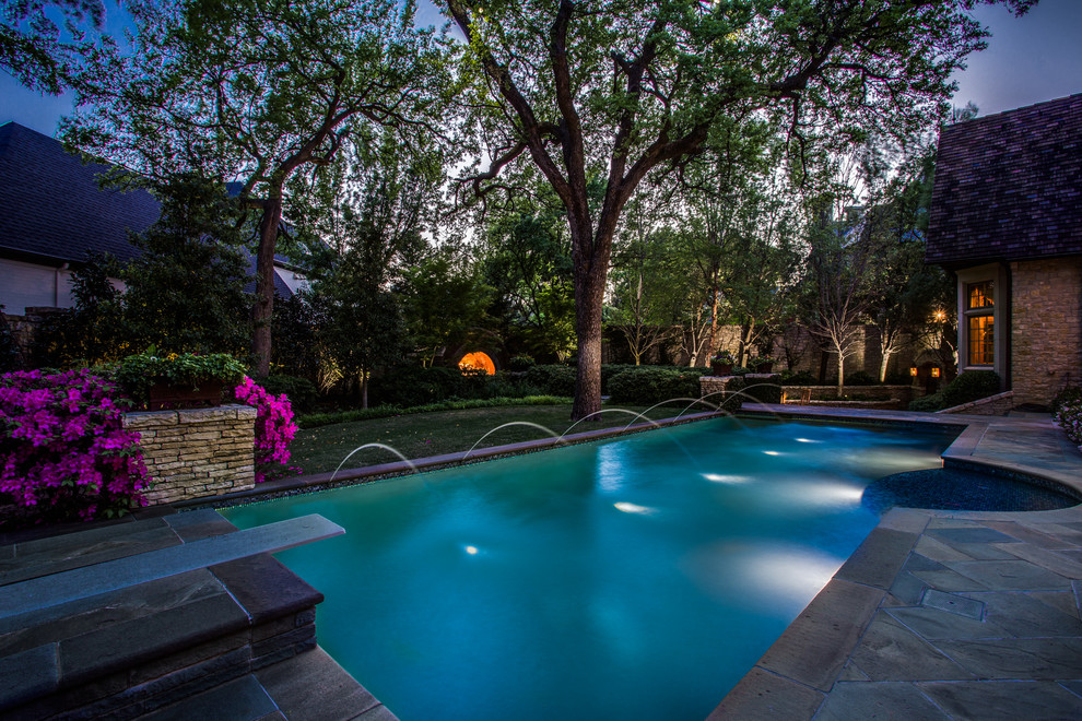 Elegant backyard rectangular pool fountain photo in Dallas