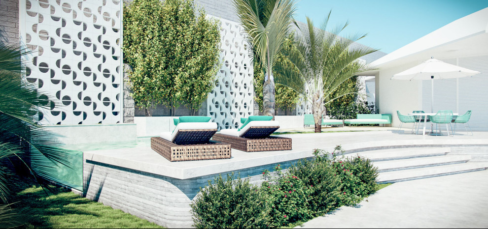 Imagen de piscina natural exótica pequeña a medida en patio trasero con paisajismo de piscina y losas de hormigón