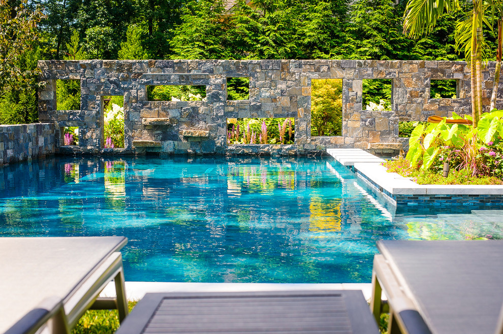 This is an example of a small rustic back l-shaped swimming pool in New York.