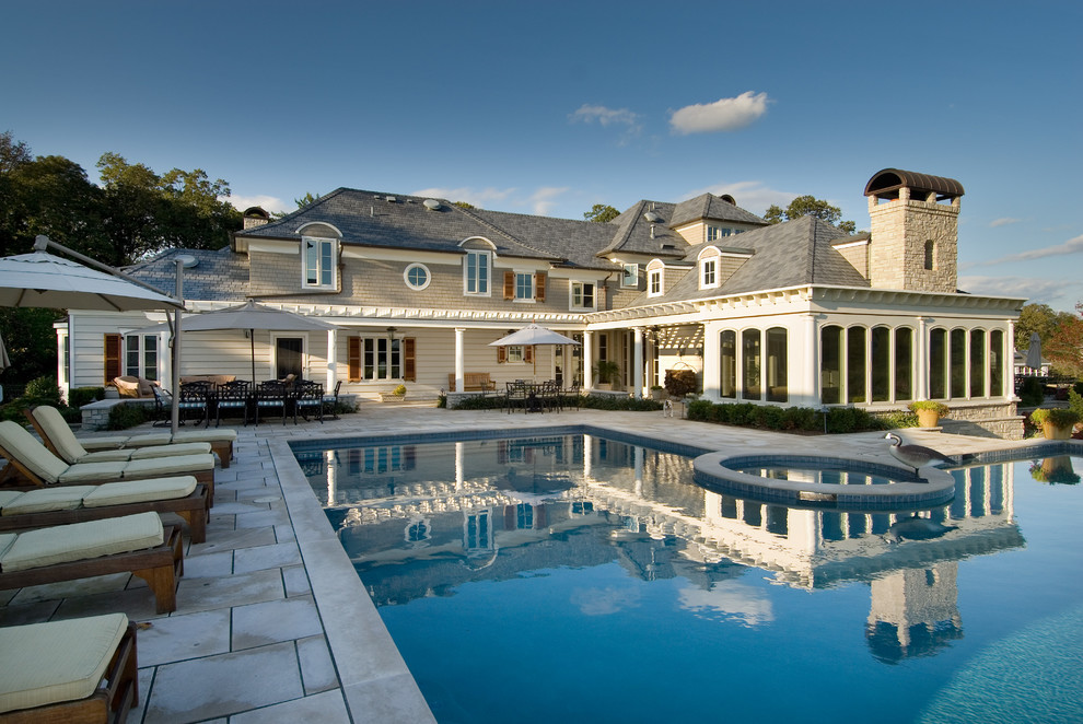 Design ideas for an expansive nautical back custom shaped swimming pool in New York.