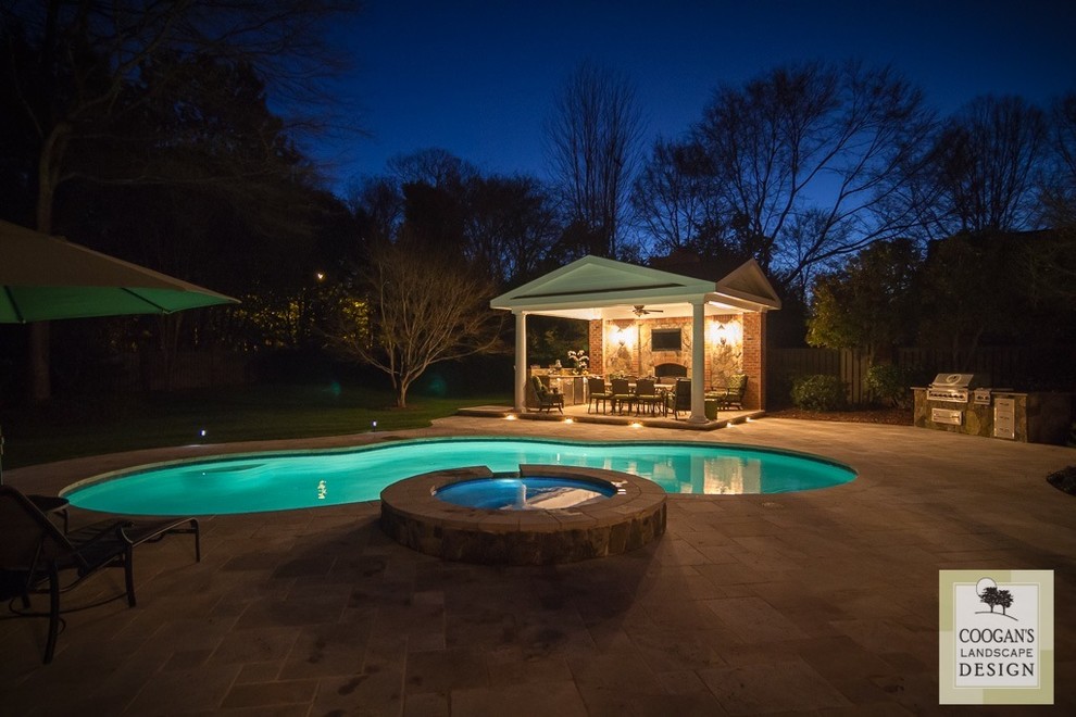 Traditional swimming pool in Charlotte.