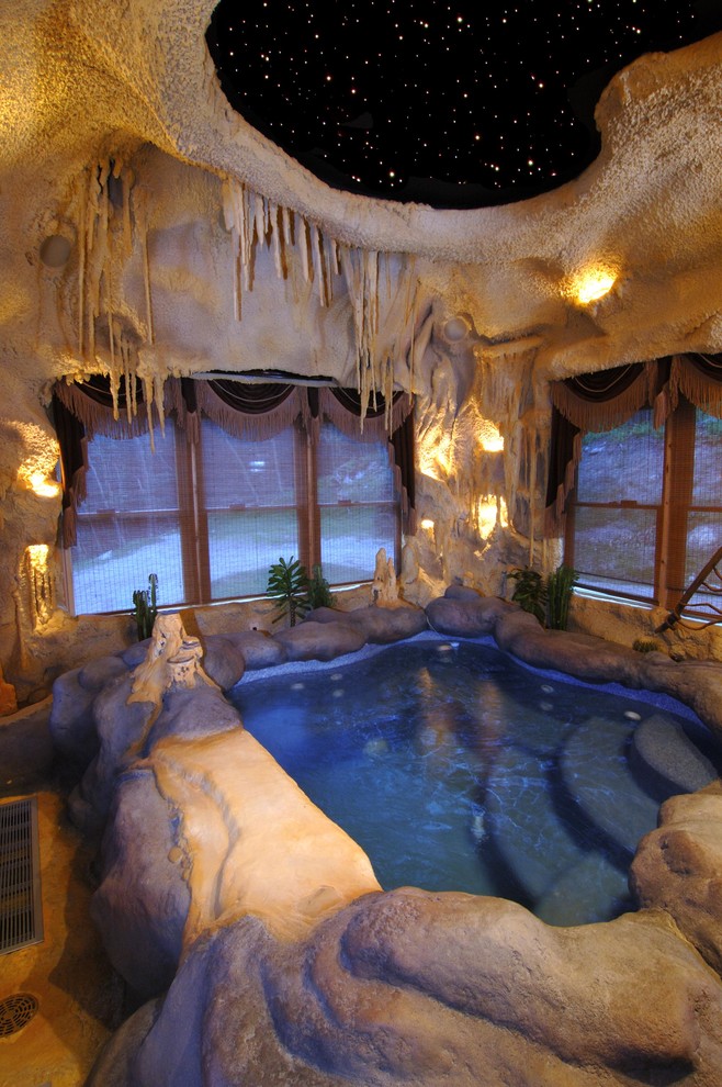 Mountain style indoor pool photo in Other