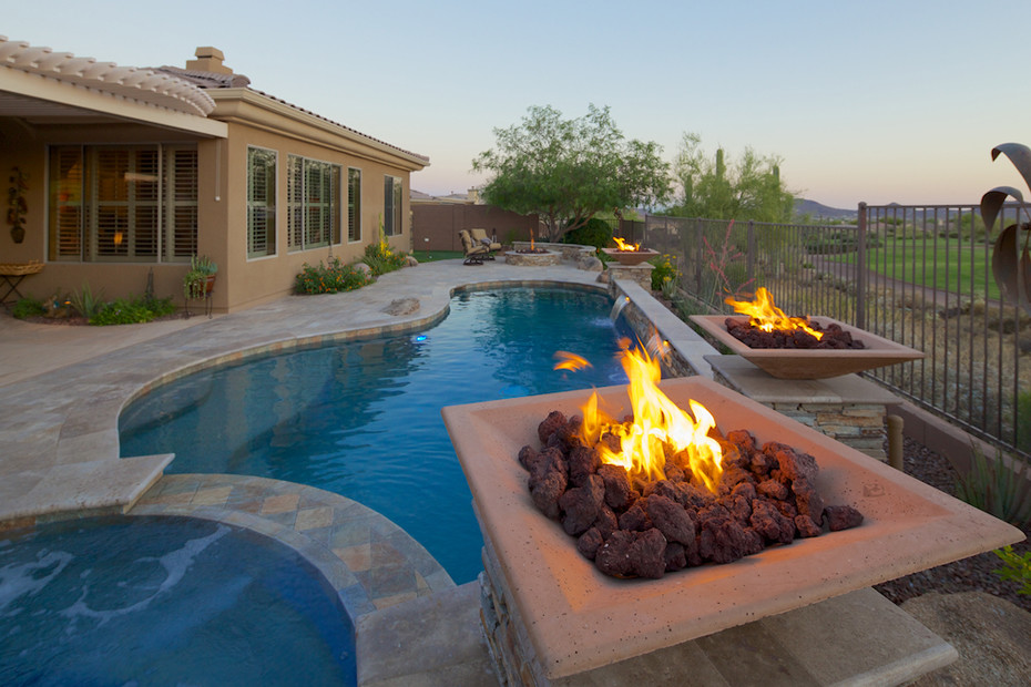 Design ideas for a contemporary swimming pool in Phoenix.