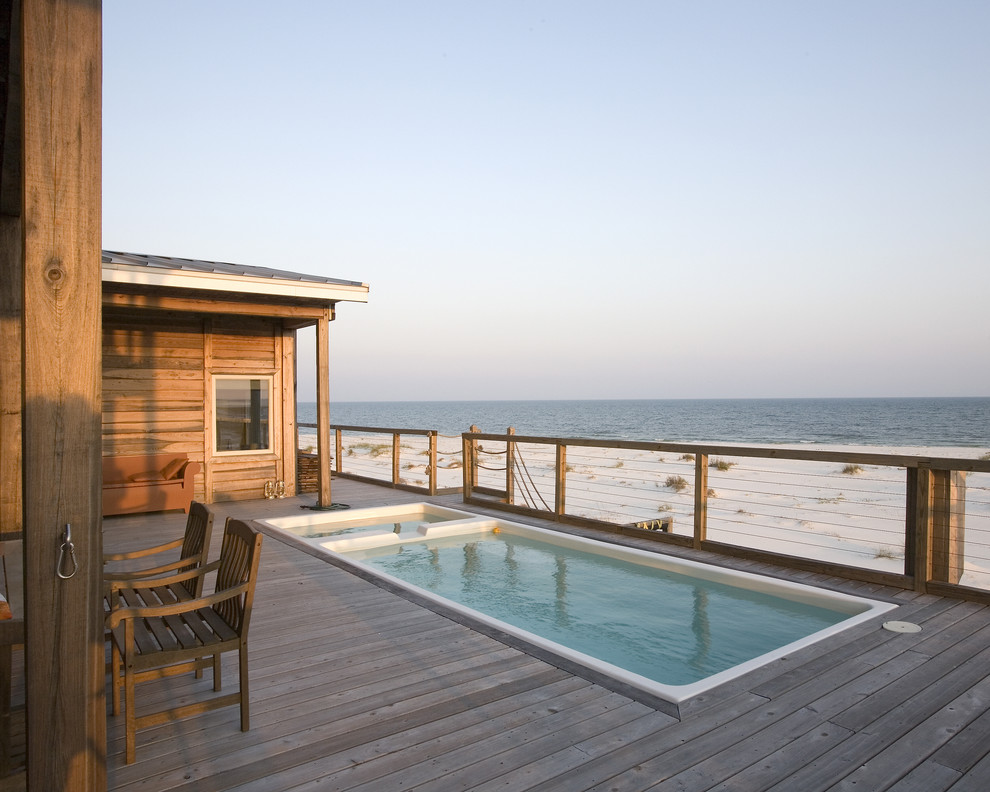 Example of a beach style pool design in Tampa