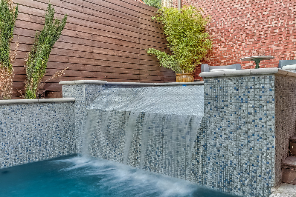 Pool fountain - mid-sized modern courtyard tile and rectangular natural pool fountain idea in Dallas