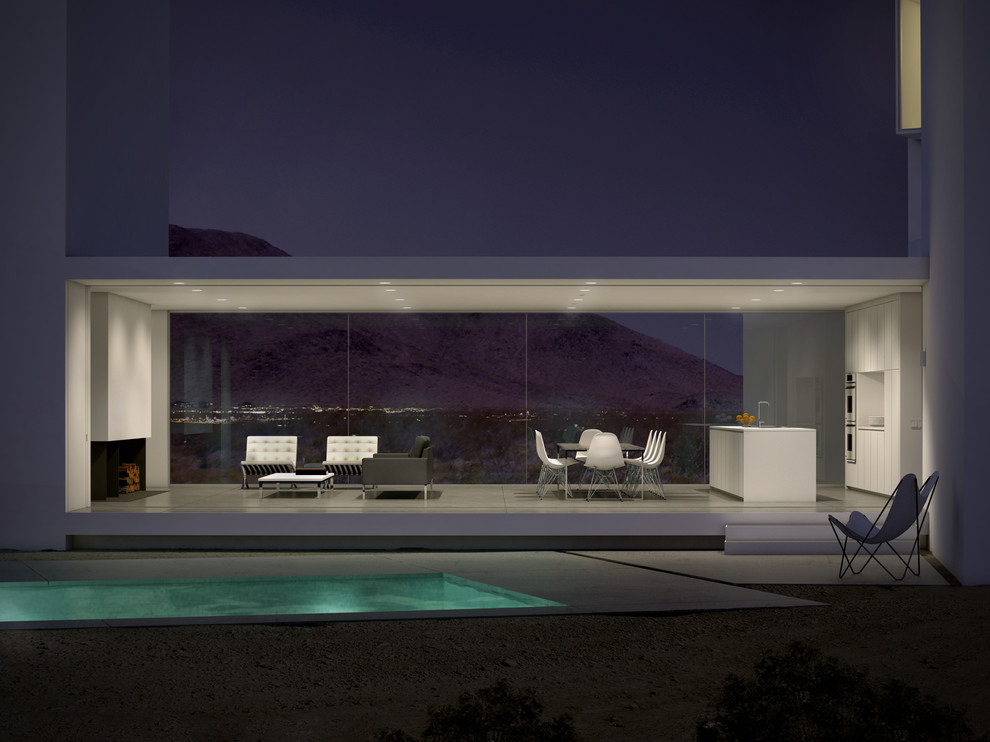 Mittelgroßes Modernes Sportbecken hinter dem Haus in rechteckiger Form mit Betonplatten in Los Angeles