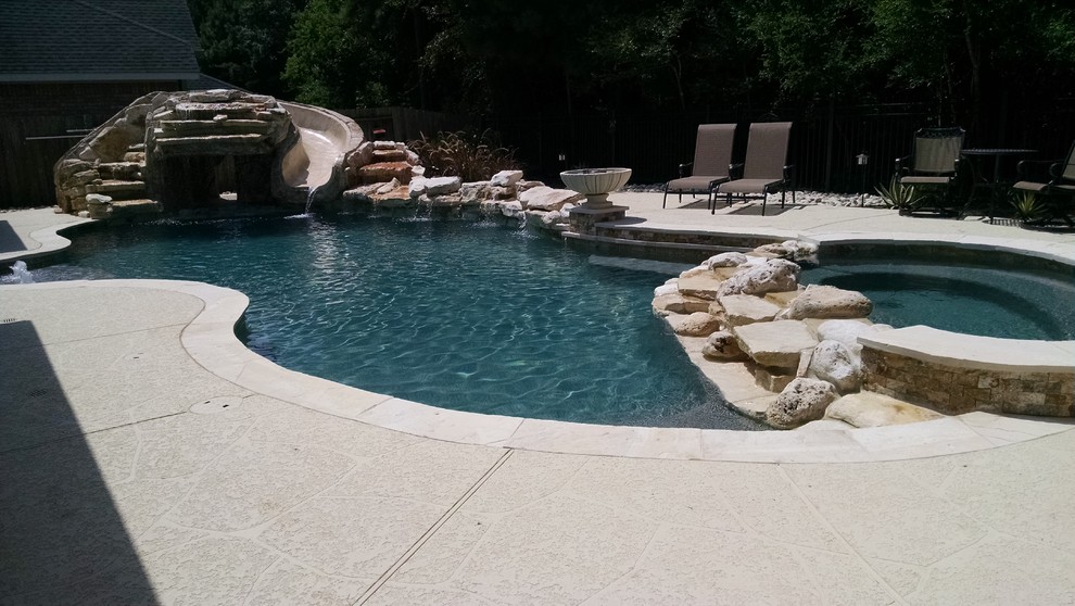 Freeform Limestone Pool with CaveSlideWaterfall Classique Piscine