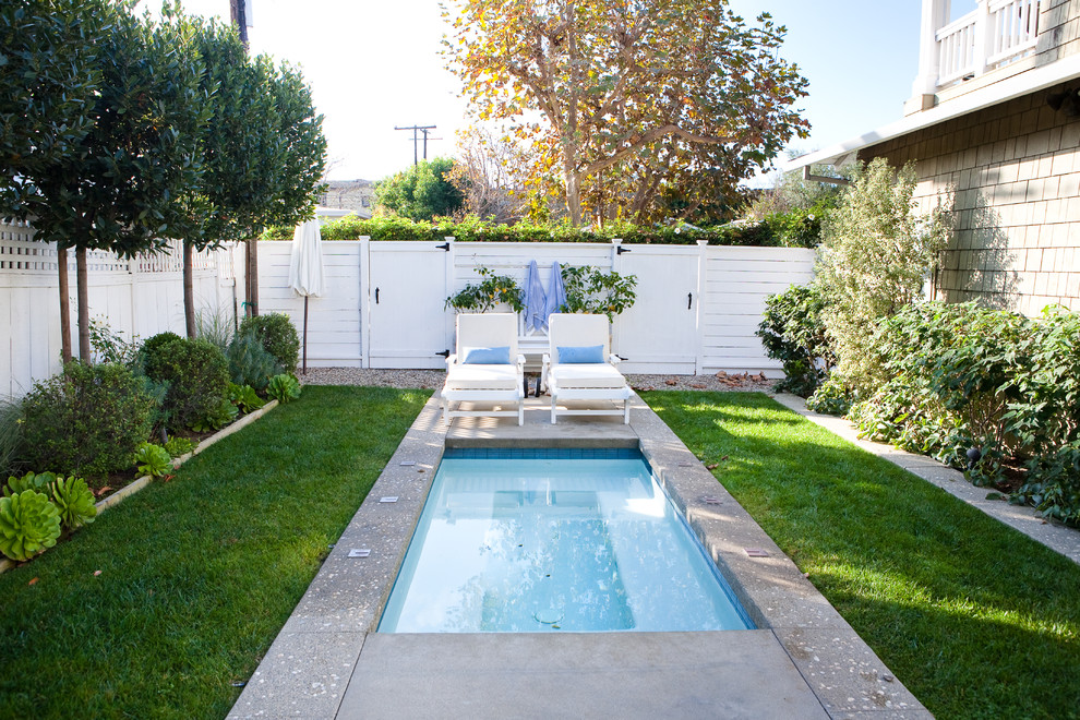 Example of a small classic backyard pool design in Los Angeles