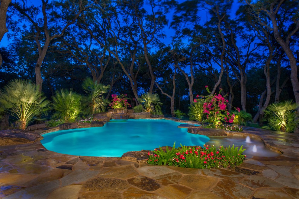 Inspiration for a tropical pool remodel in Austin
