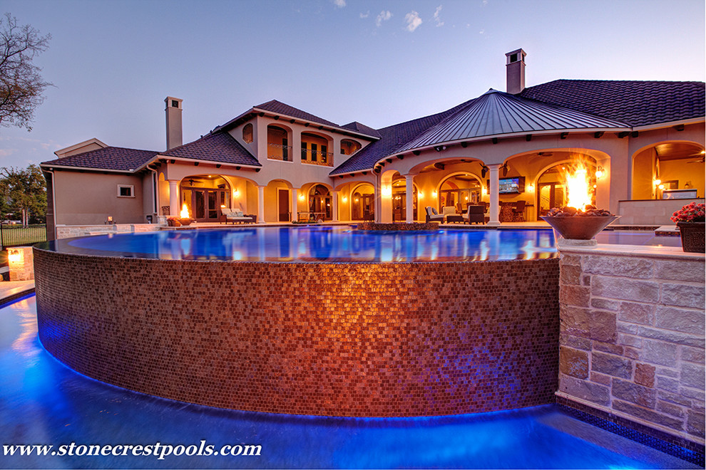 Glass tile Edge pool Mediterranean Pool Dallas by Stonecrest