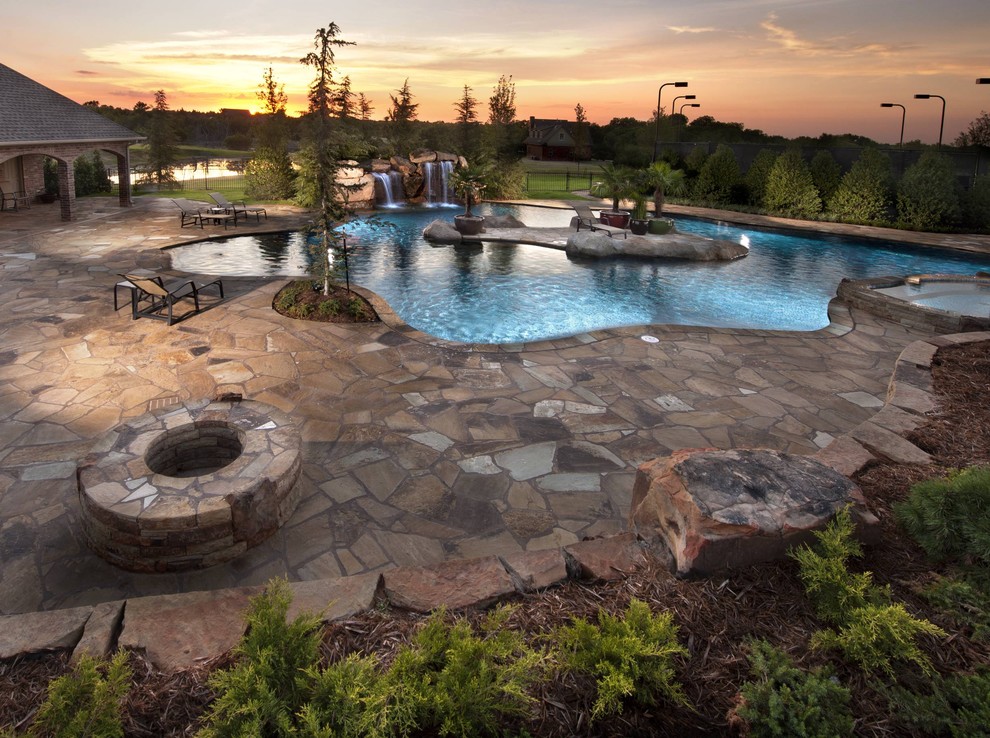 Island style pool photo in Oklahoma City