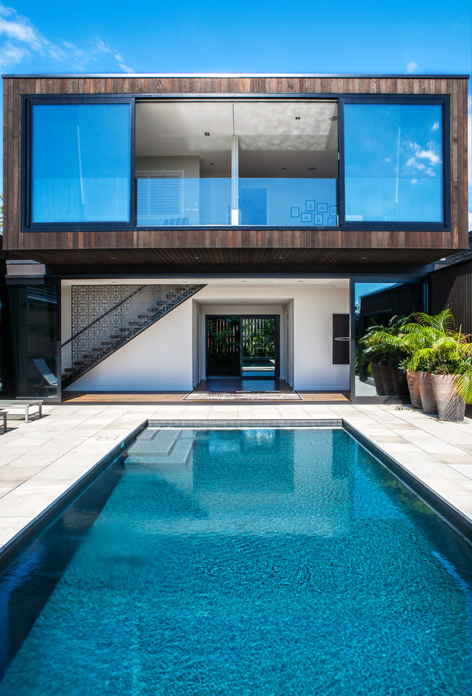 Photo of a contemporary rectangular swimming pool in Auckland.