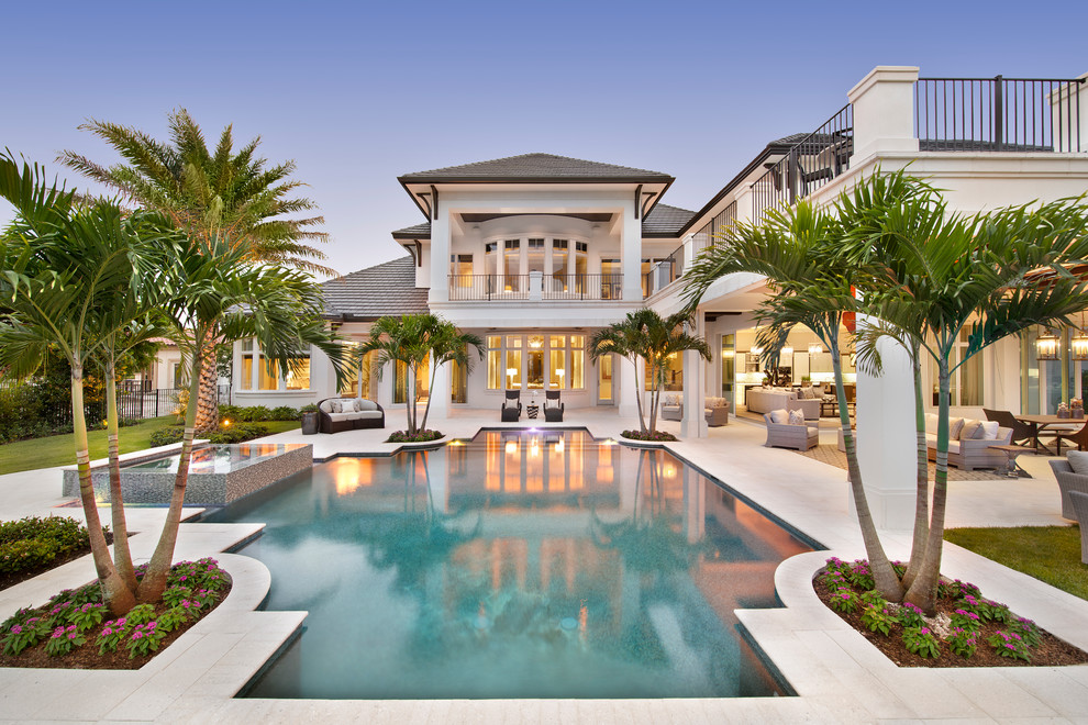 Foto de casa de la piscina y piscina exótica extra grande a medida en patio trasero