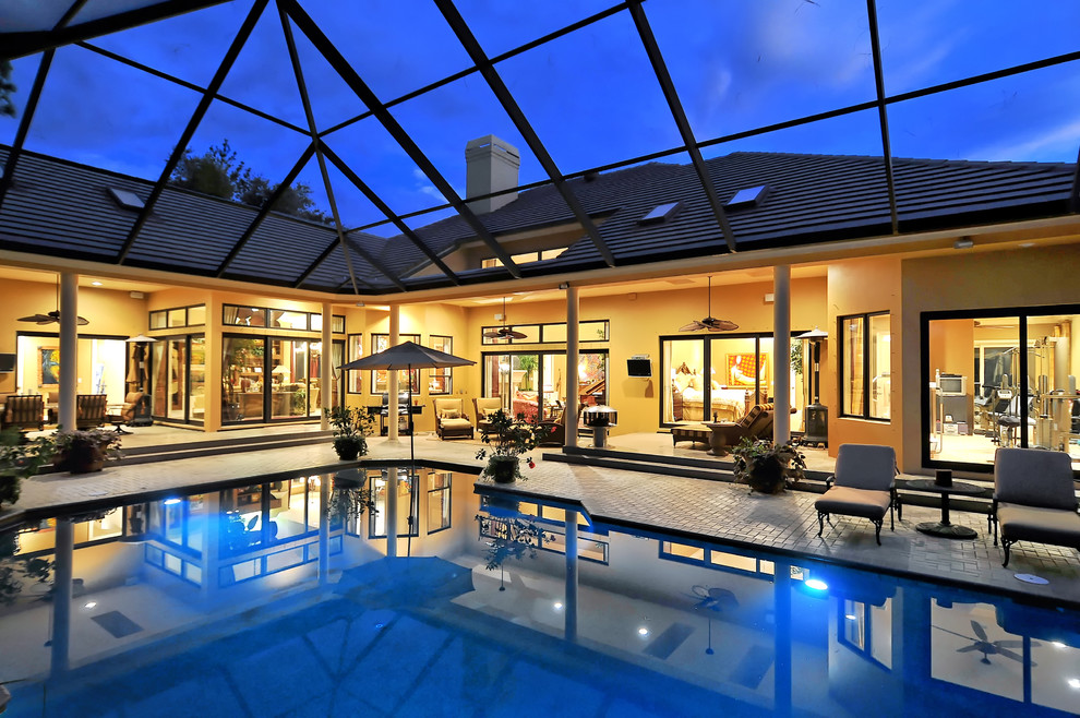 Pool - tropical indoor pool idea in Tampa