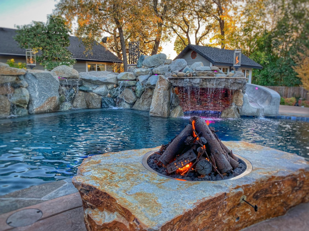 Inspiration for a huge cottage custom-shaped pool remodel in Sacramento