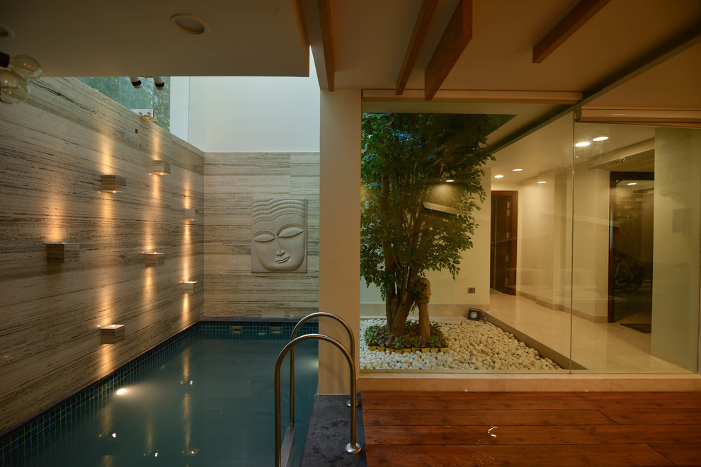 Design ideas for a world-inspired swimming pool in Delhi.