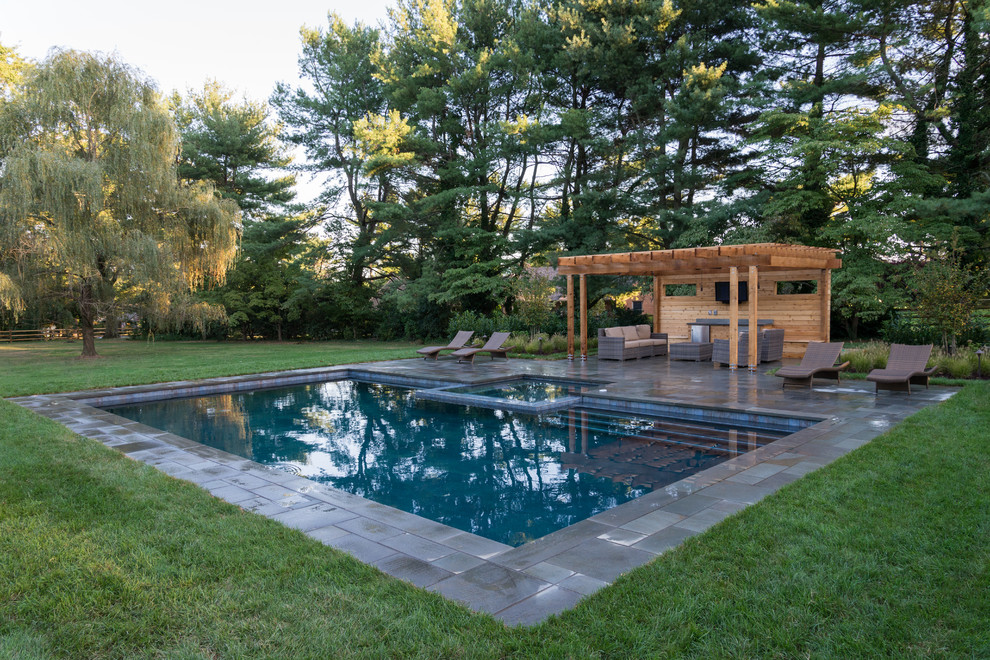 Inspiration for a rustic tile and rectangular hot tub remodel in Philadelphia