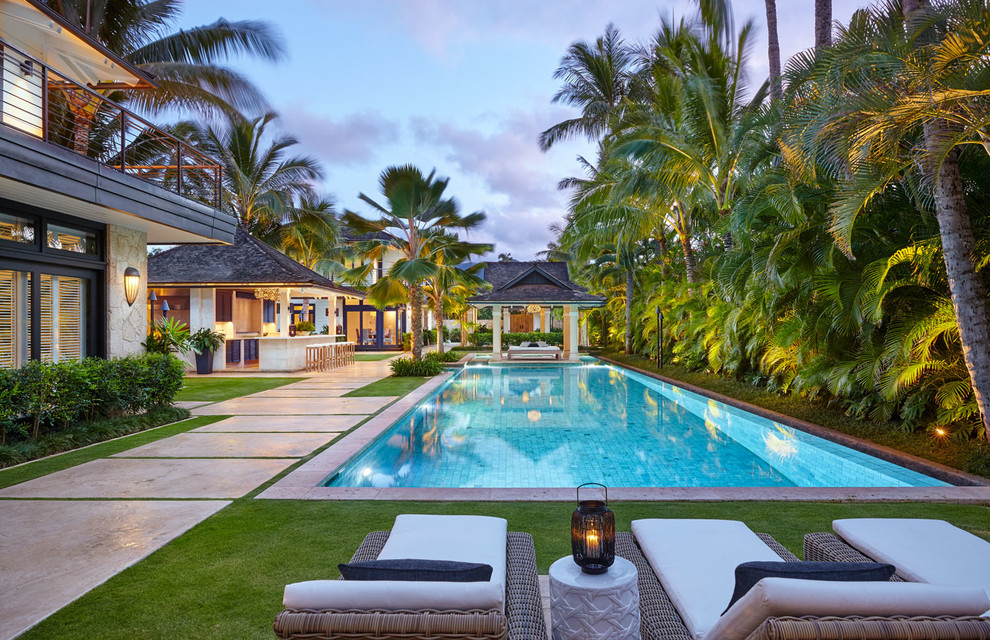 Inspiration for a world-inspired back rectangular swimming pool in Hawaii with a bar area.