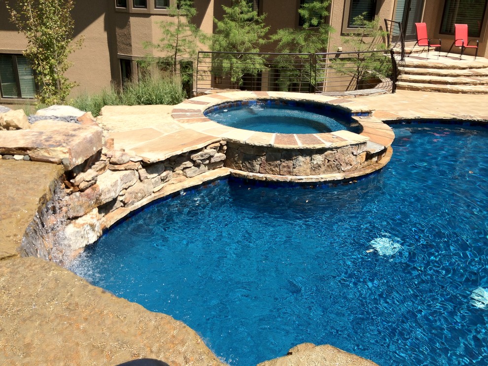 Inspiration for a mediterranean pool remodel in Kansas City