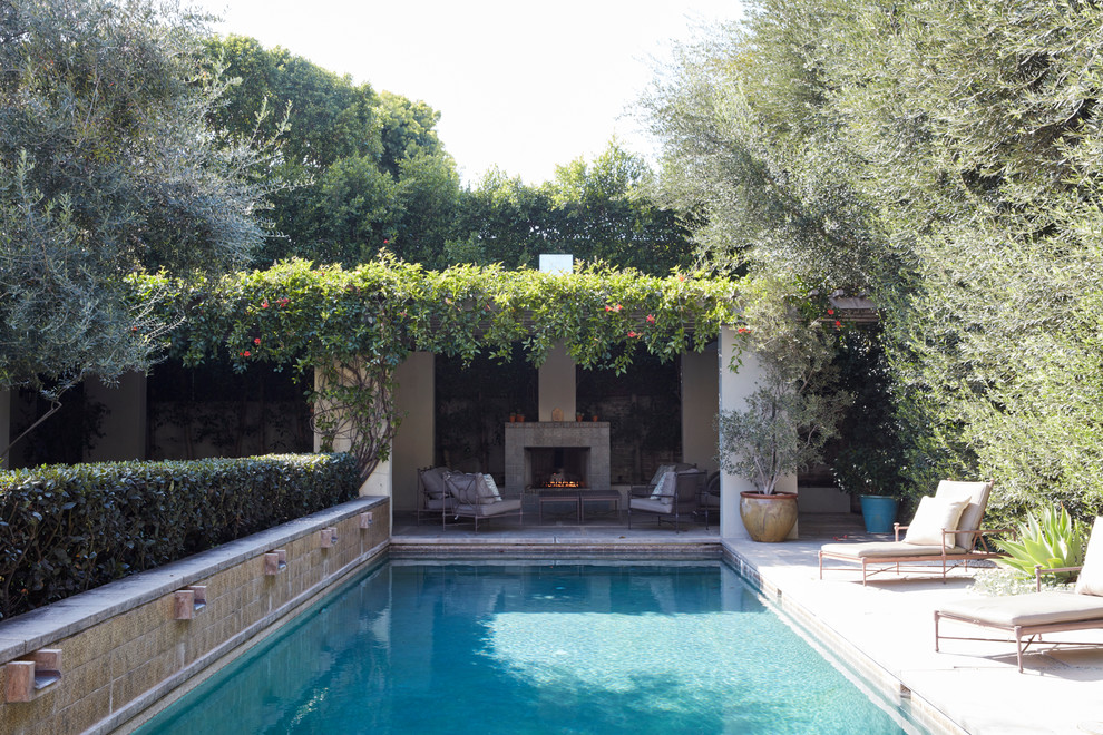 Design ideas for a mediterranean back rectangular lengths swimming pool in Los Angeles.