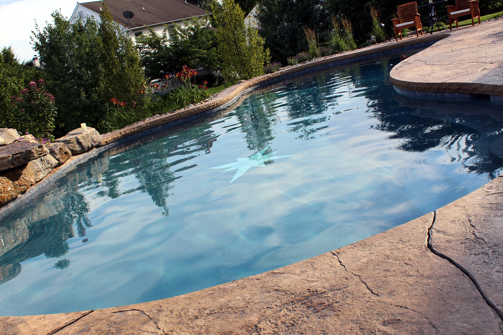 Hanover Township custom pool with boulder waterfall Traditional Pool Philadelphia by B&B