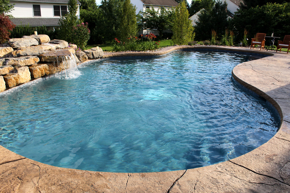 Hanover Township custom pool with boulder waterfall Traditional Pool Philadelphia by B&B