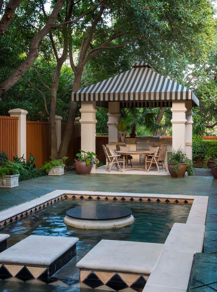 Hot tub - mid-sized contemporary backyard stamped concrete and rectangular natural hot tub idea in Dallas