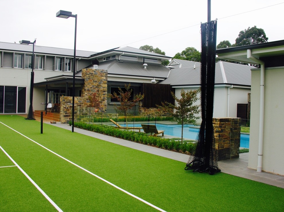 Mittelgroßer Moderner Pool hinter dem Haus in rechteckiger Form mit Dielen in Adelaide