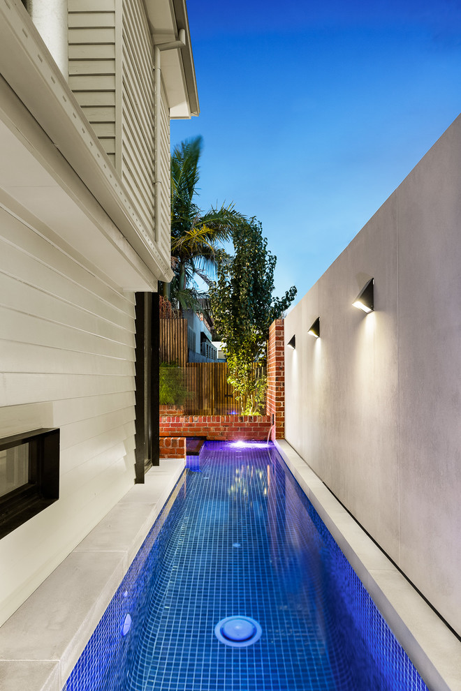 Pool - small modern backyard pool idea in Melbourne