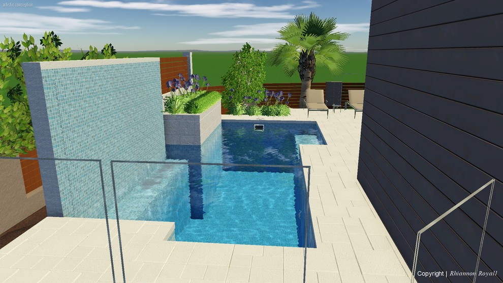 Esempio di una piccola piscina minimal personalizzata davanti casa con fontane e pavimentazioni in pietra naturale