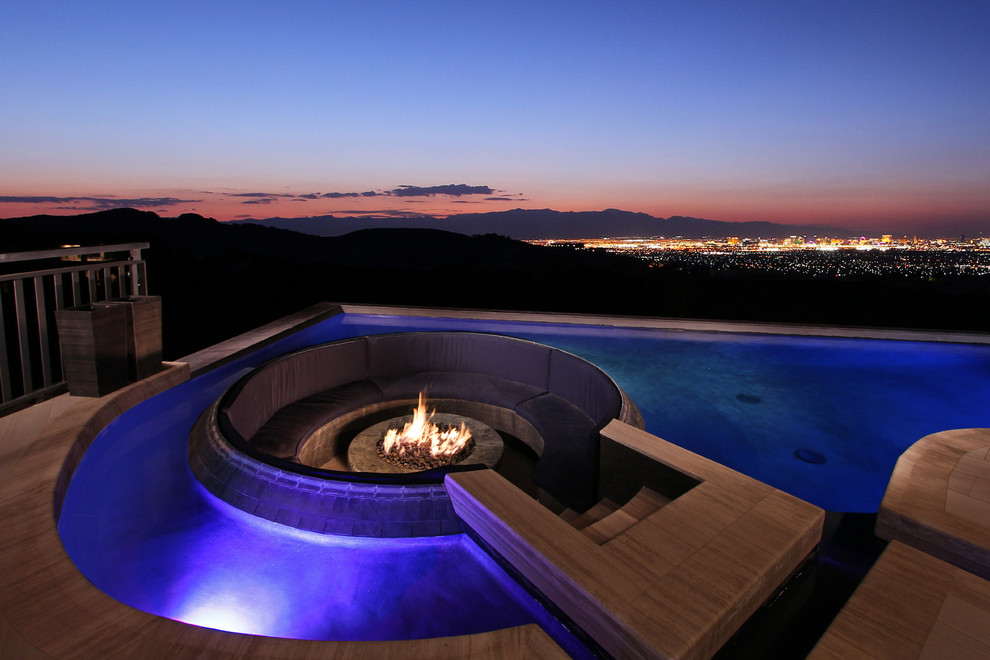 Pool fountain - mid-sized modern rooftop custom-shaped infinity pool fountain idea in Las Vegas