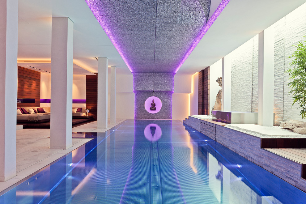 Large trendy indoor rectangular pool photo in Essen