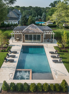 rectangle pool with sun shelf and spa