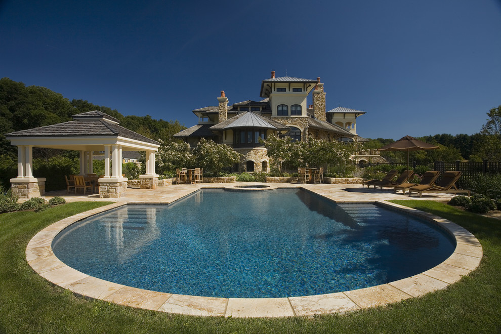 This is an example of a mediterranean custom shaped swimming pool in New York.