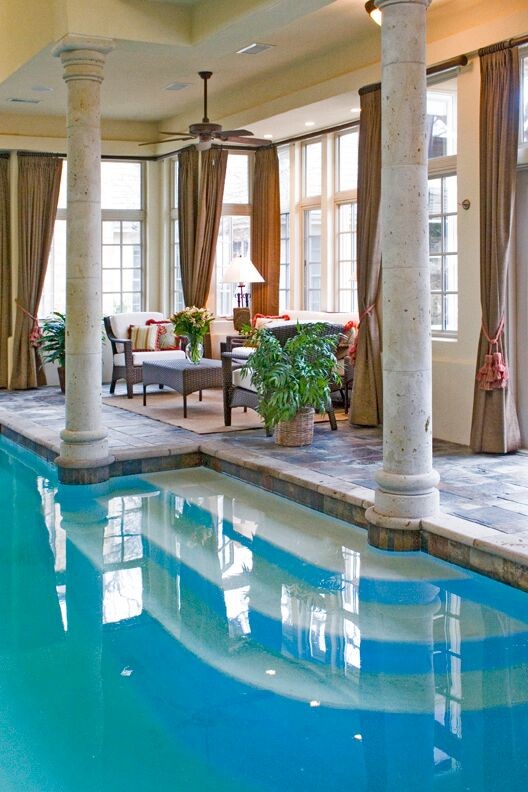 Large tuscan indoor rectangular pool photo in Austin