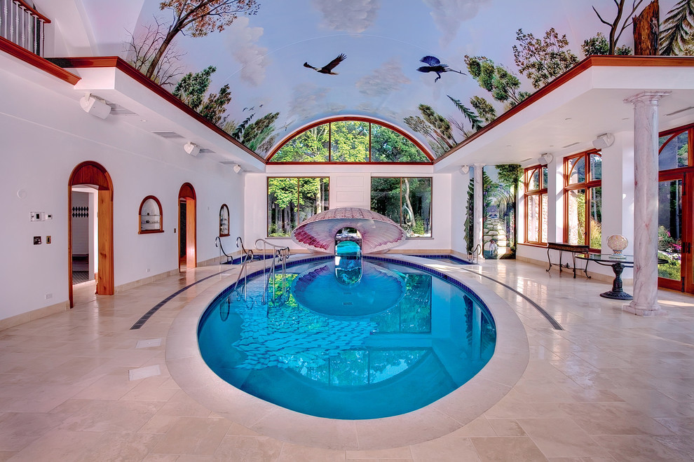Imagen de piscina bohemia redondeada y interior