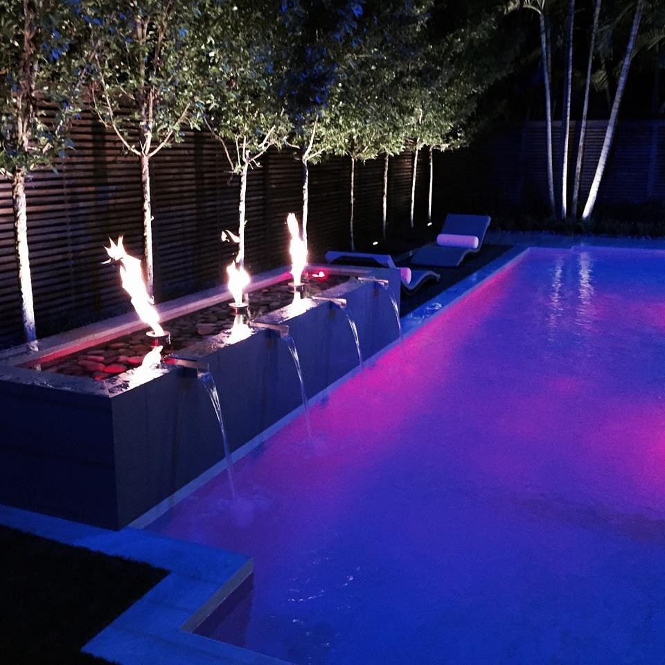Pool - mid-sized modern pool idea in Miami