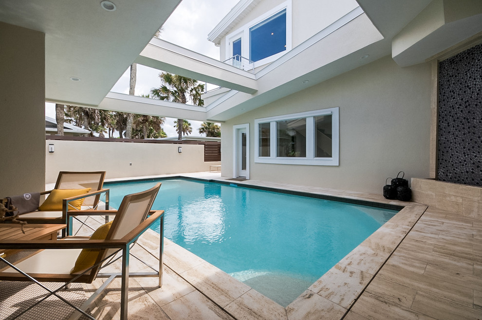 Inspiration for a contemporary rectangular pool remodel in Jacksonville